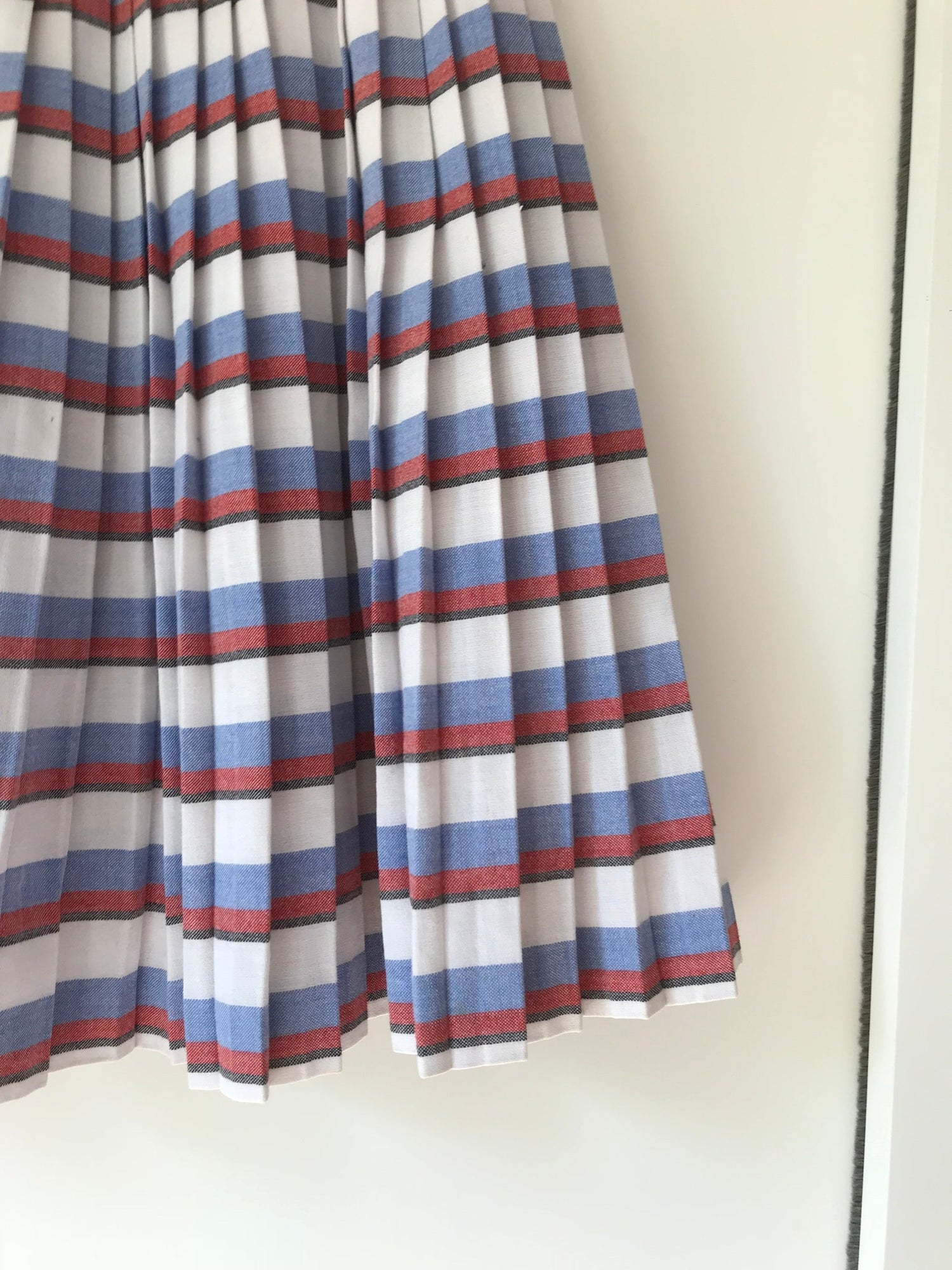 Jupe courte plissée