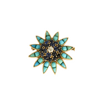 Broche "Etoile" en or jaune, diamants, saphirs et turquoises