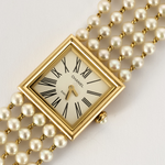 CHANEL - Mademoiselle - Montre bijou or jaune et perles