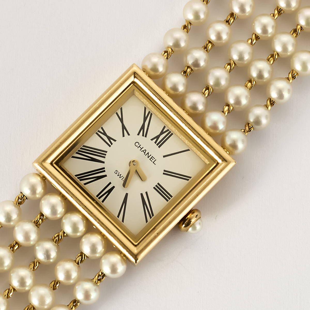 CHANEL - Mademoiselle - Montre bijou or jaune et perles