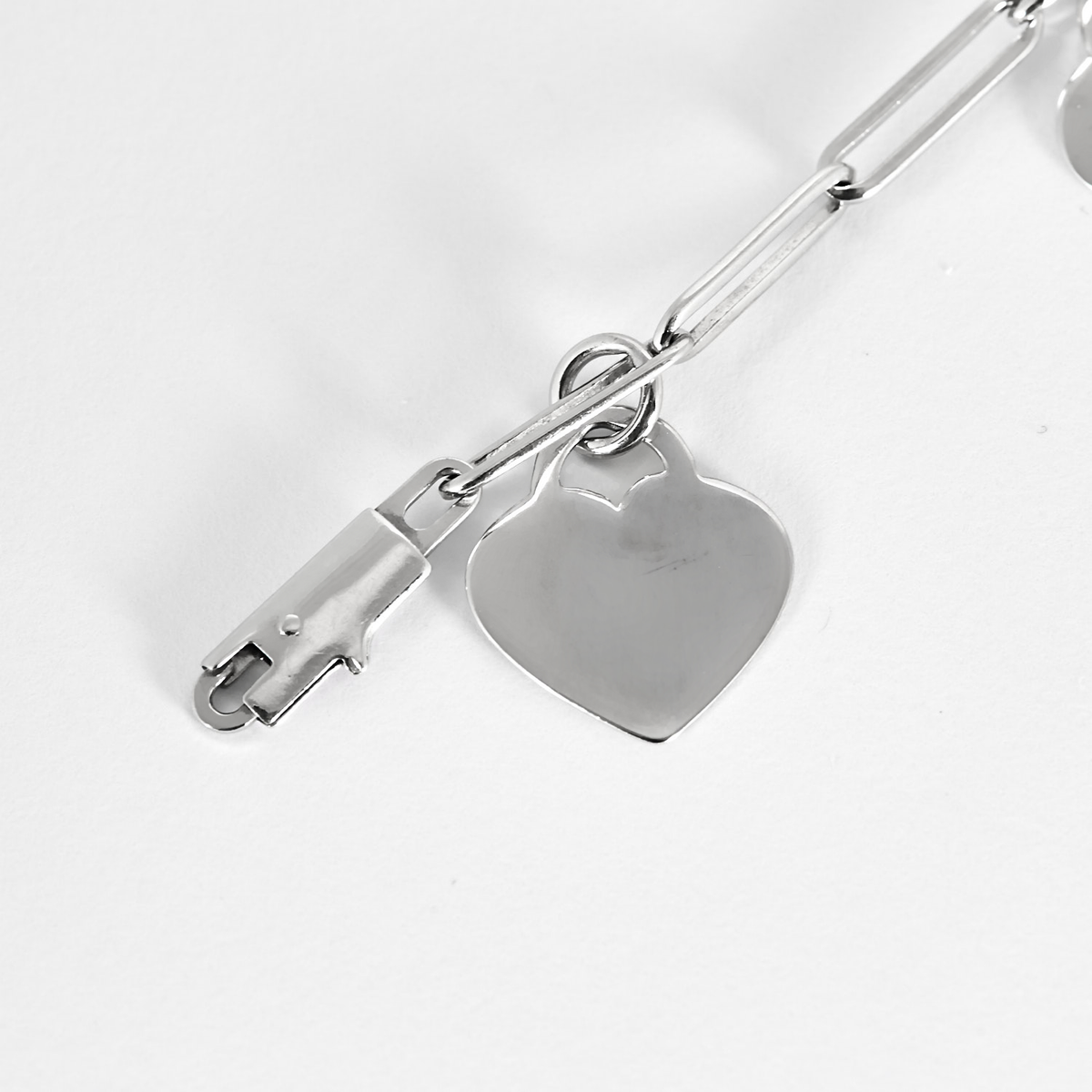 Dinh Van - Bracelet en or blanc et pampilles coeur