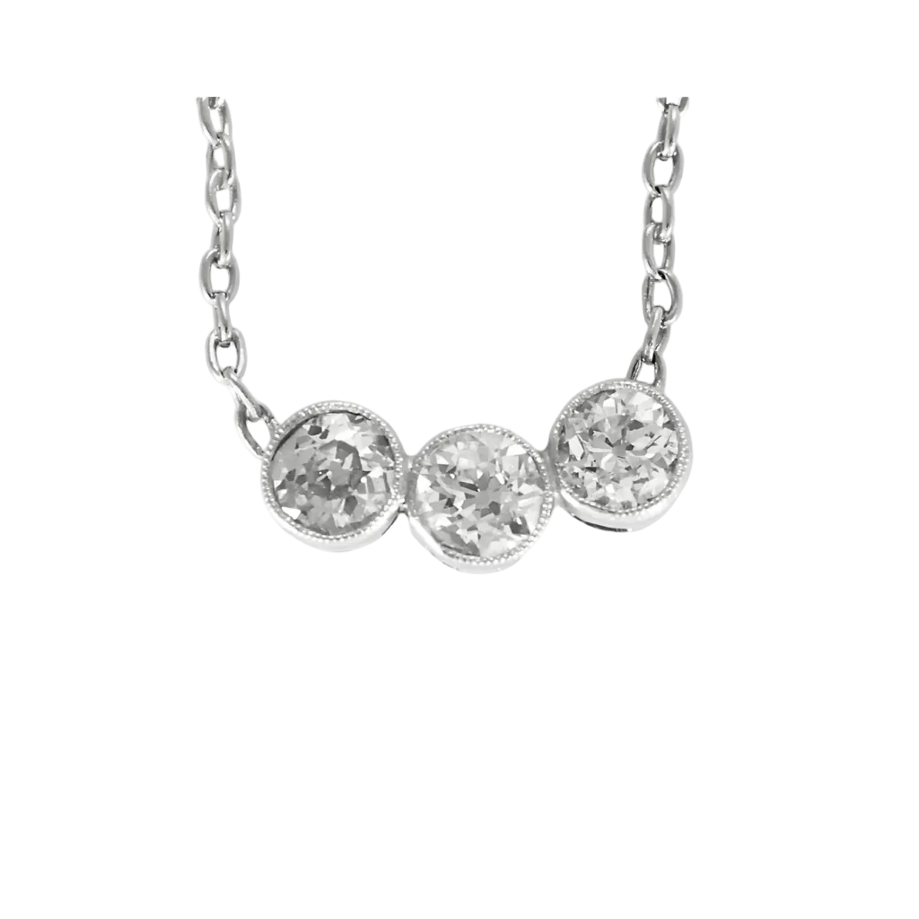 Collier en or gris, platine et trois diamants.