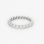 DE BEERS - Alliance souple en or gris et diamants