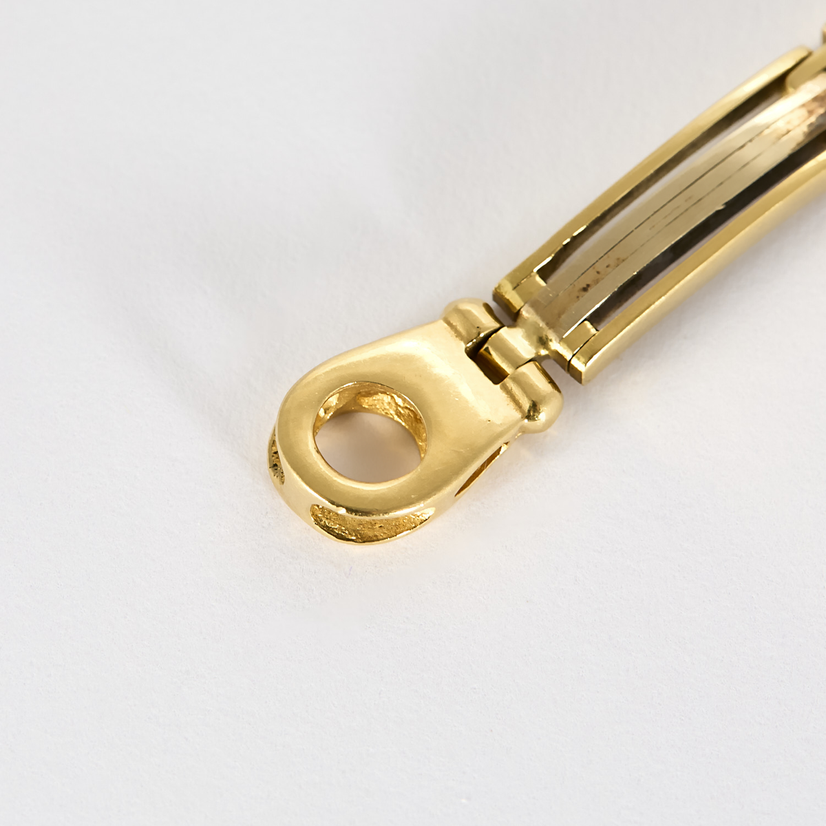 Bracelet de type gourmette en or blanc et or jaune