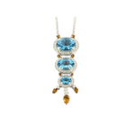 Collier en or gris, diamants et topazes bleues, citrines