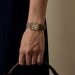 Cartier Montre Tank en or jaune et diamants