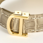 Cartier Montre Tank en or jaune et diamants