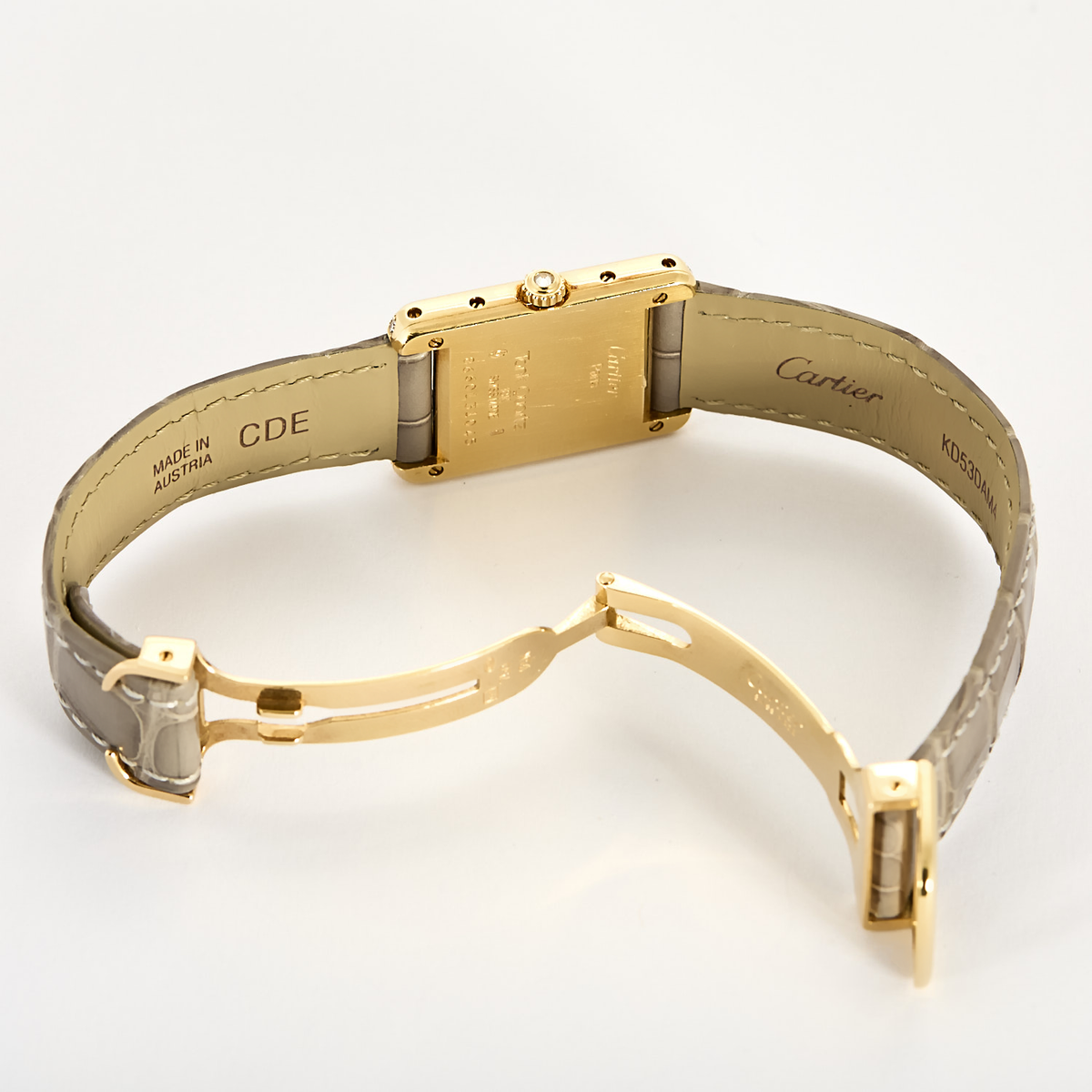 Cartier Montre Tank en or jaune et diamants