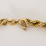 Collier en Or jaune 18k et diamants.