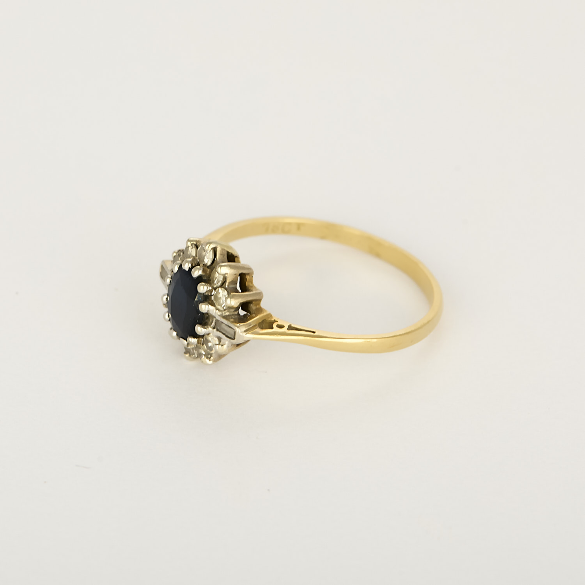 Bague marguerite en or jaune, or blanc, saphir et diamants