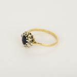 Bague marguerite en or jaune, or blanc, saphir et diamants