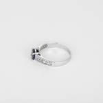 Élégante bague Solitaire en or blanc, tanzanite et diamants