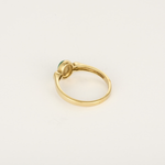 Élégante bague en or jaune, émeraude et diamants : 0,35 carat