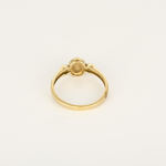 Élégante bague en or jaune, émeraude et diamants : 0,35 carat