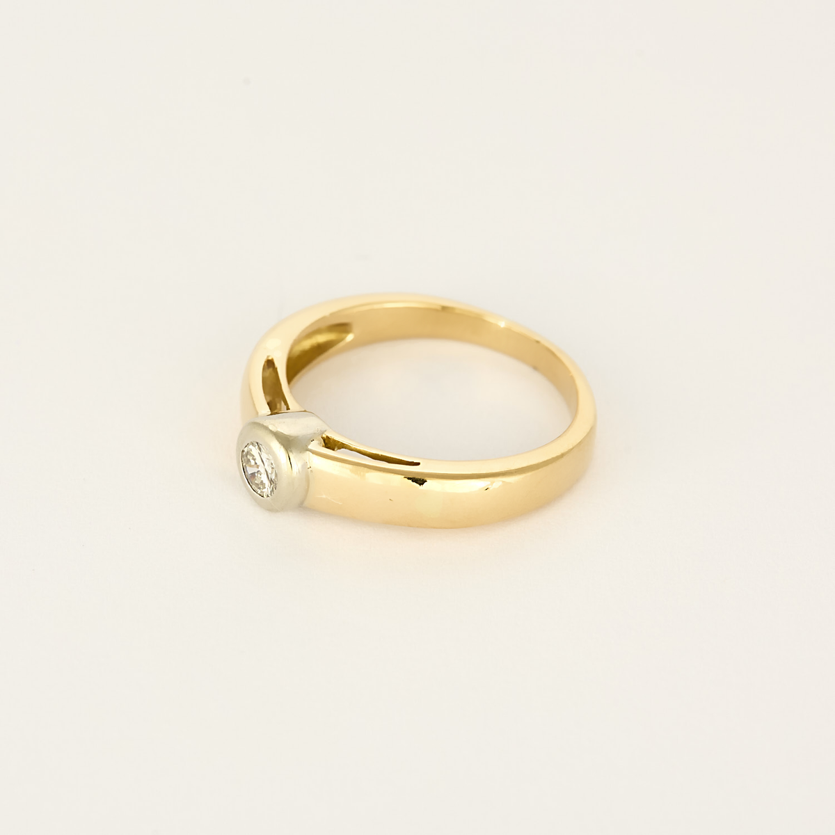Bague Solitaire en or jaune, or blanc et diamants