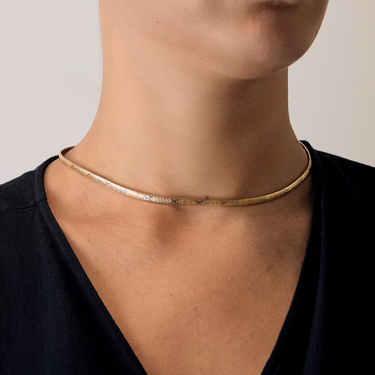 Collier ras de cou trois ors
