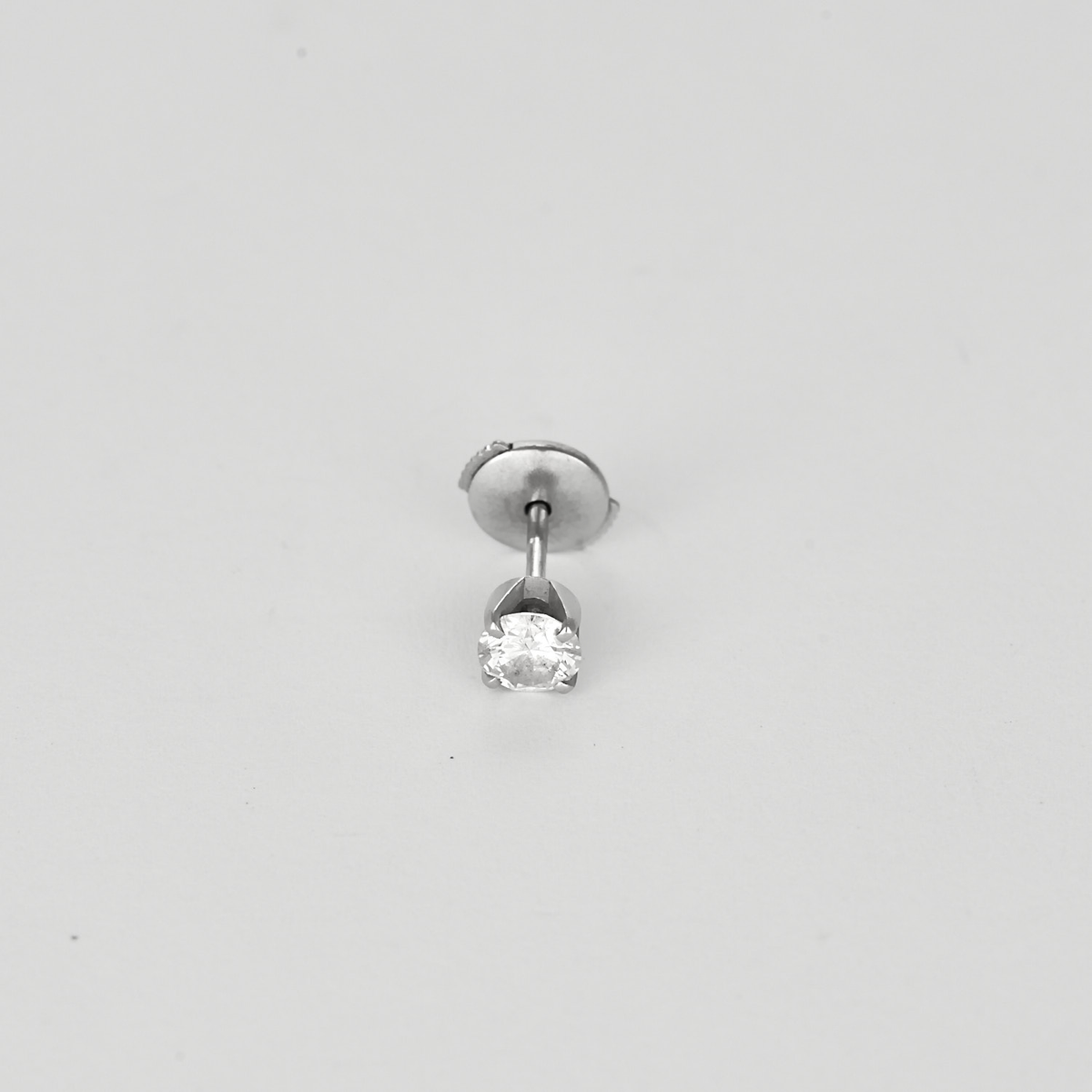 Boutons d'oreilles en or gris et diamant 0.30 carat environ