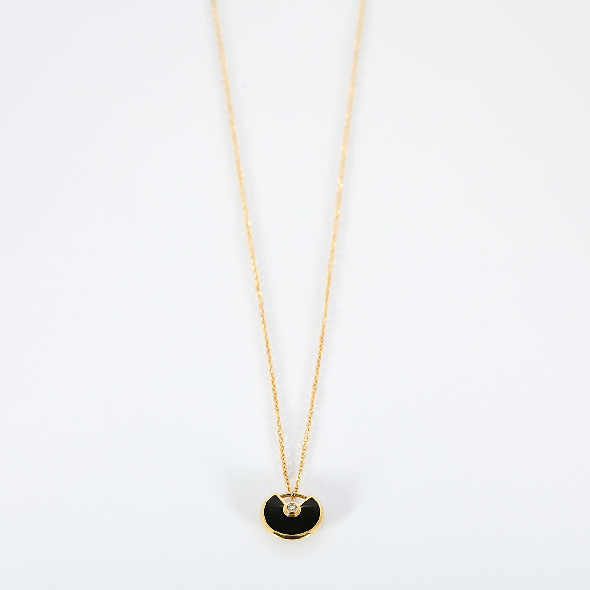 Cartier Collier Amulette de Cartier en Or rose 18k Diamant