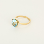 Bague coktail en or jaune 18k Topaze bleue