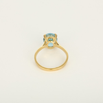 Bague coktail en or jaune 18k Topaze bleue