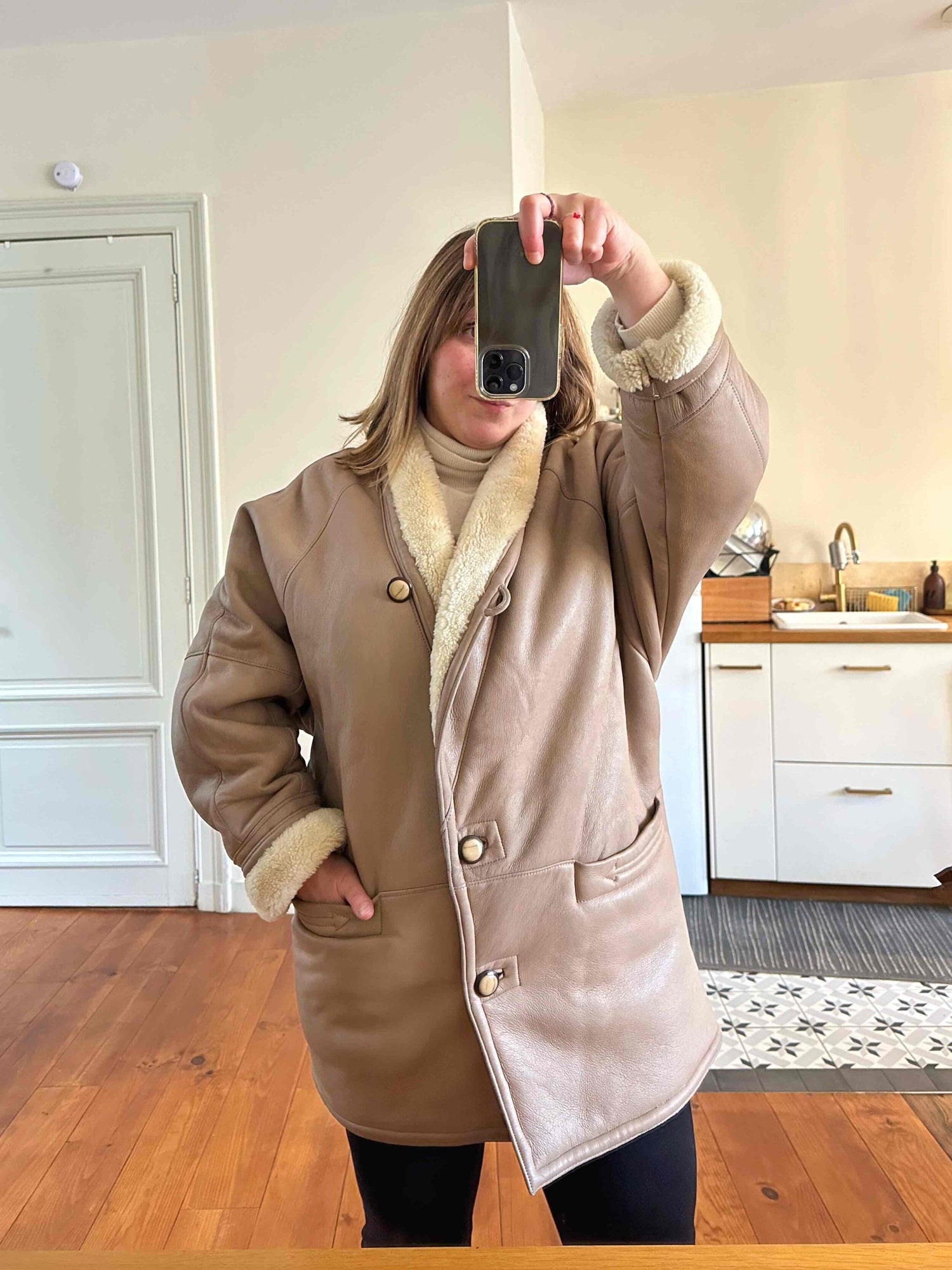 Manteau en peau lainée