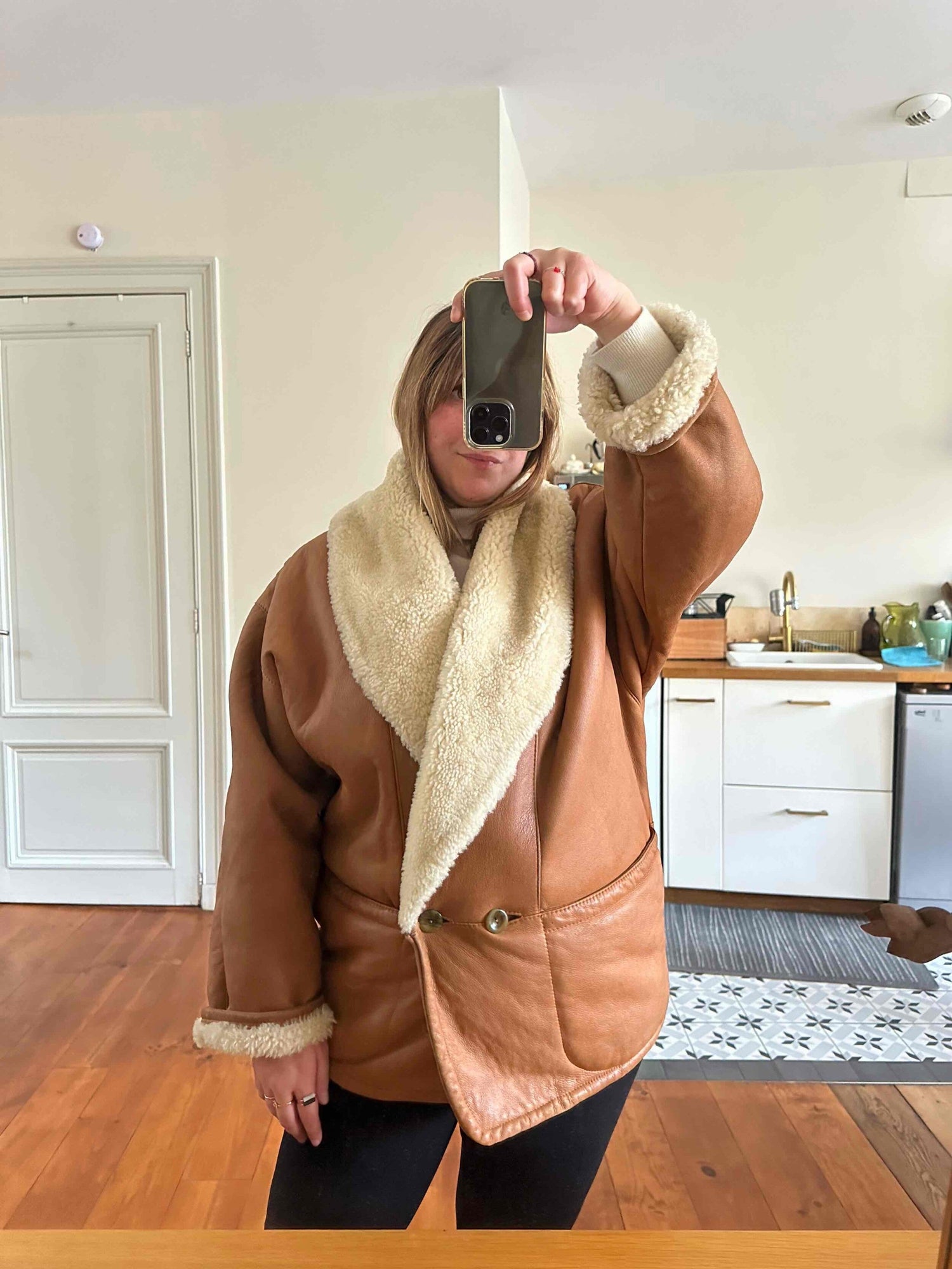 Wool-lined leather coat