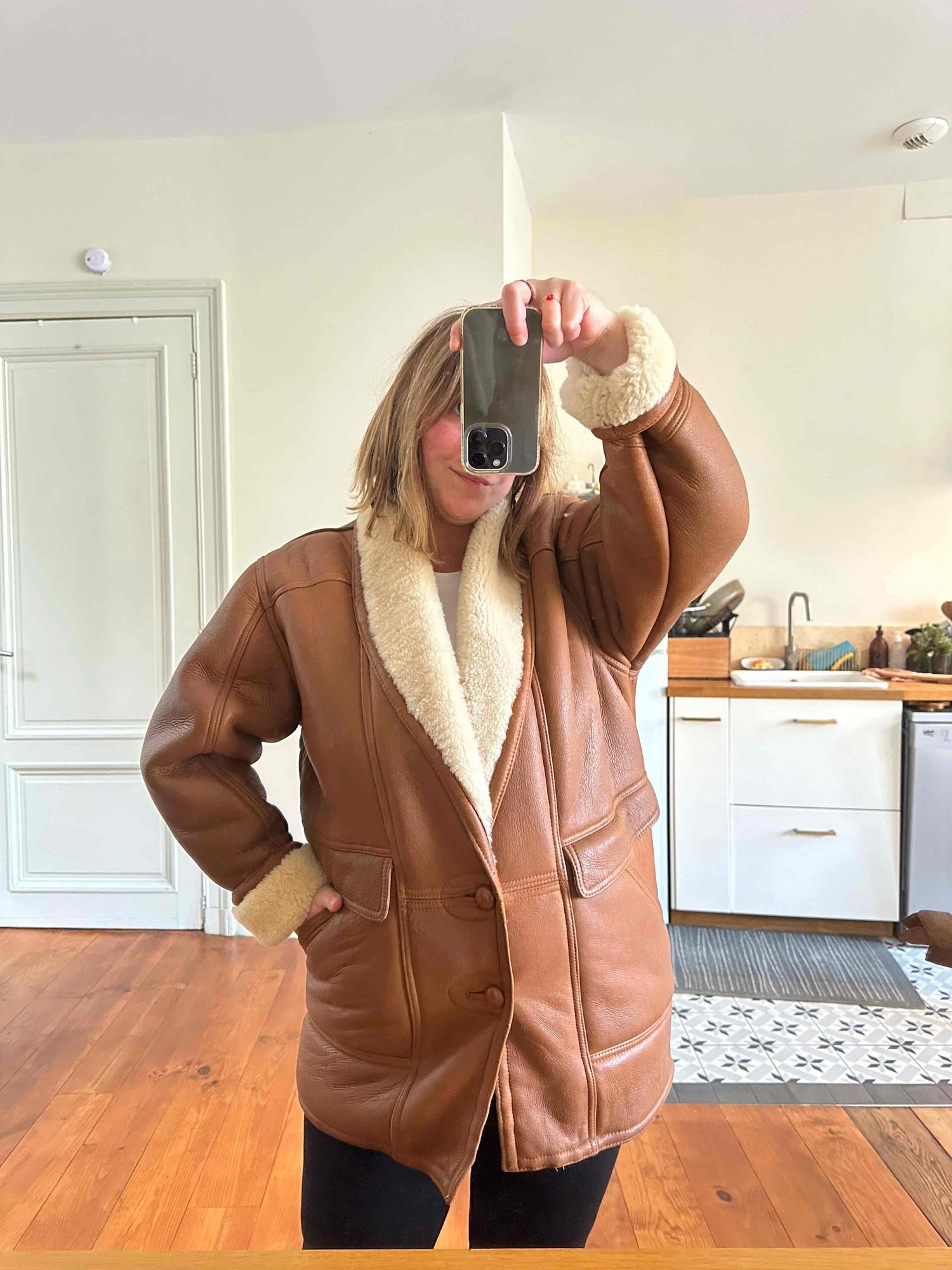 Manteau en peau lainée