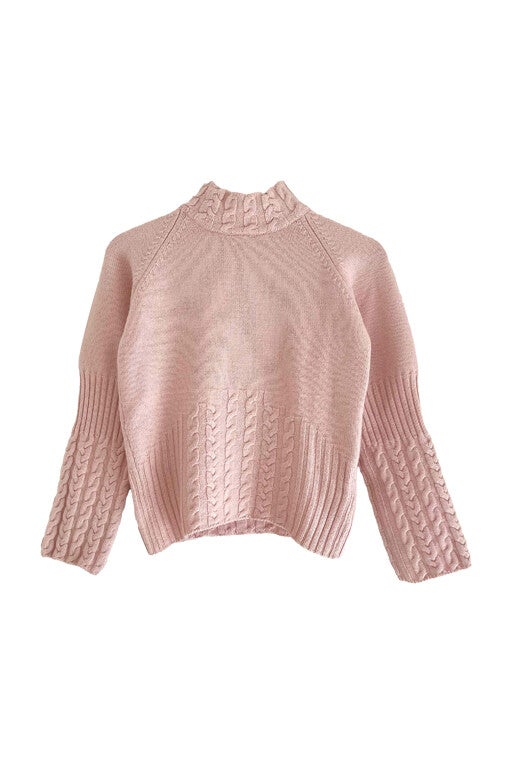 Pull en maille torsadée