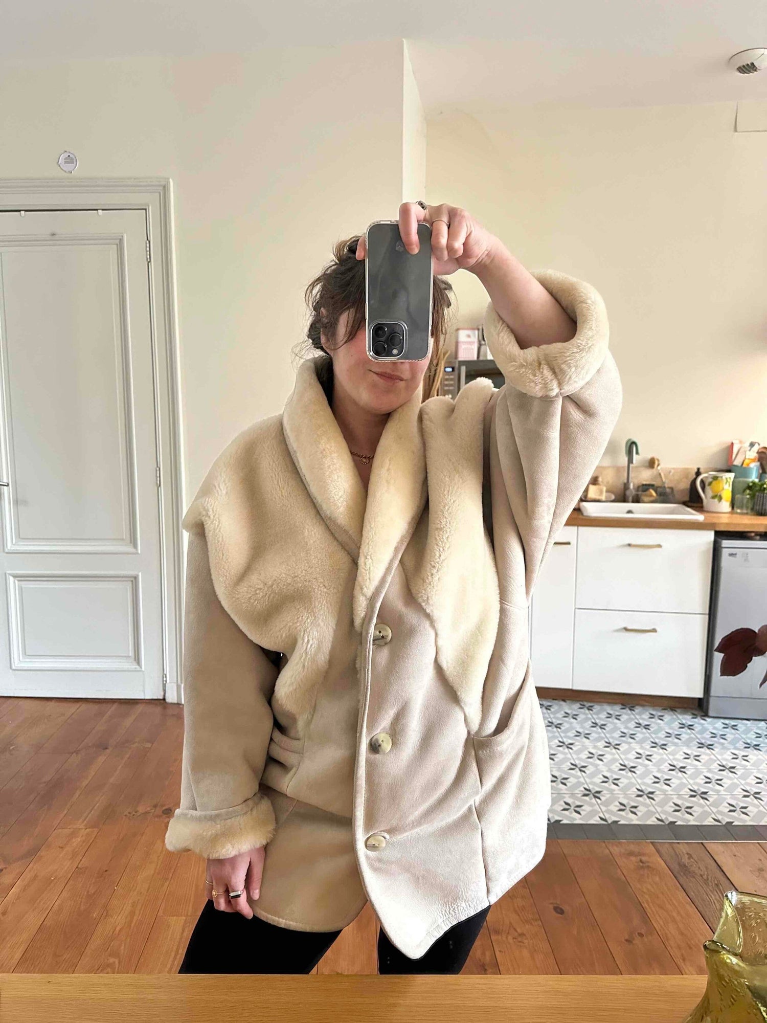 Manteau en peau lainée