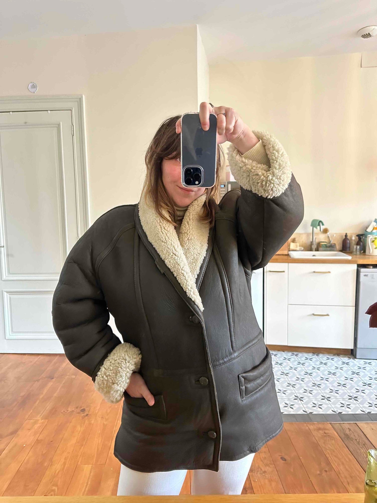 Manteau en peau lainée