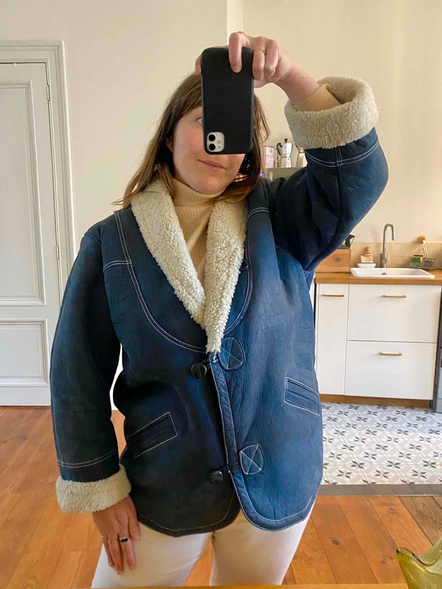Manteau en peau lainée