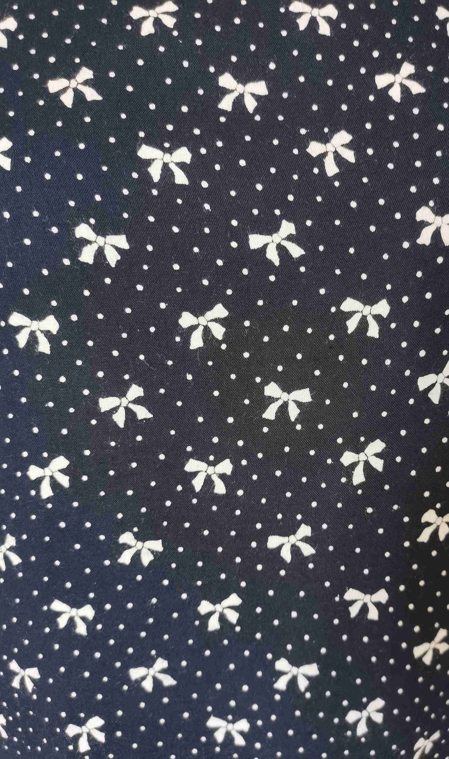 Top with knot and polka dots