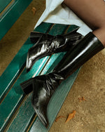 bottes noires à talon cuir vernis féminines et élégantes