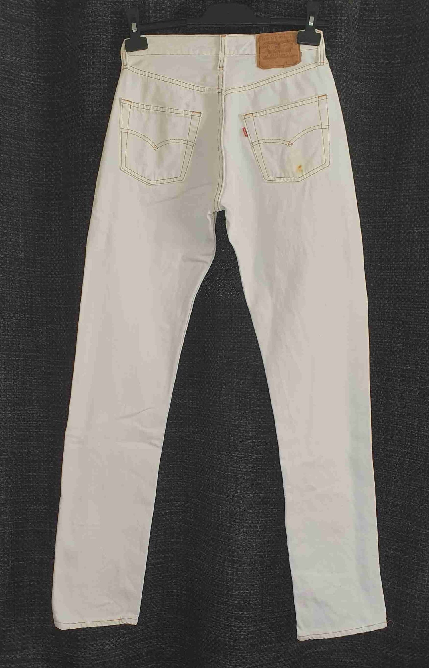 Levi's 501 jeans, waist 28, length 32.