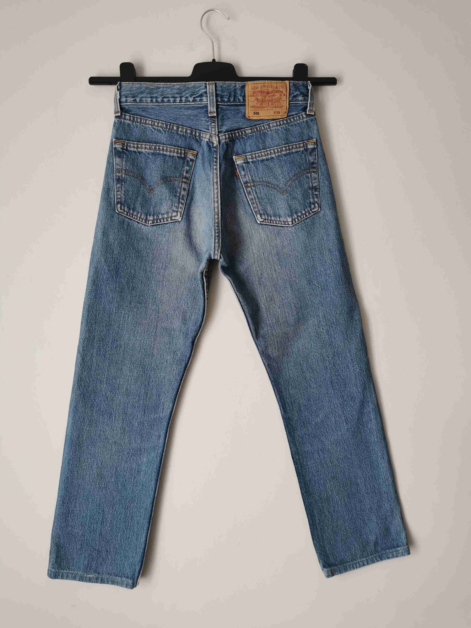 Levi's 501 jeans, waist 28, length 34.