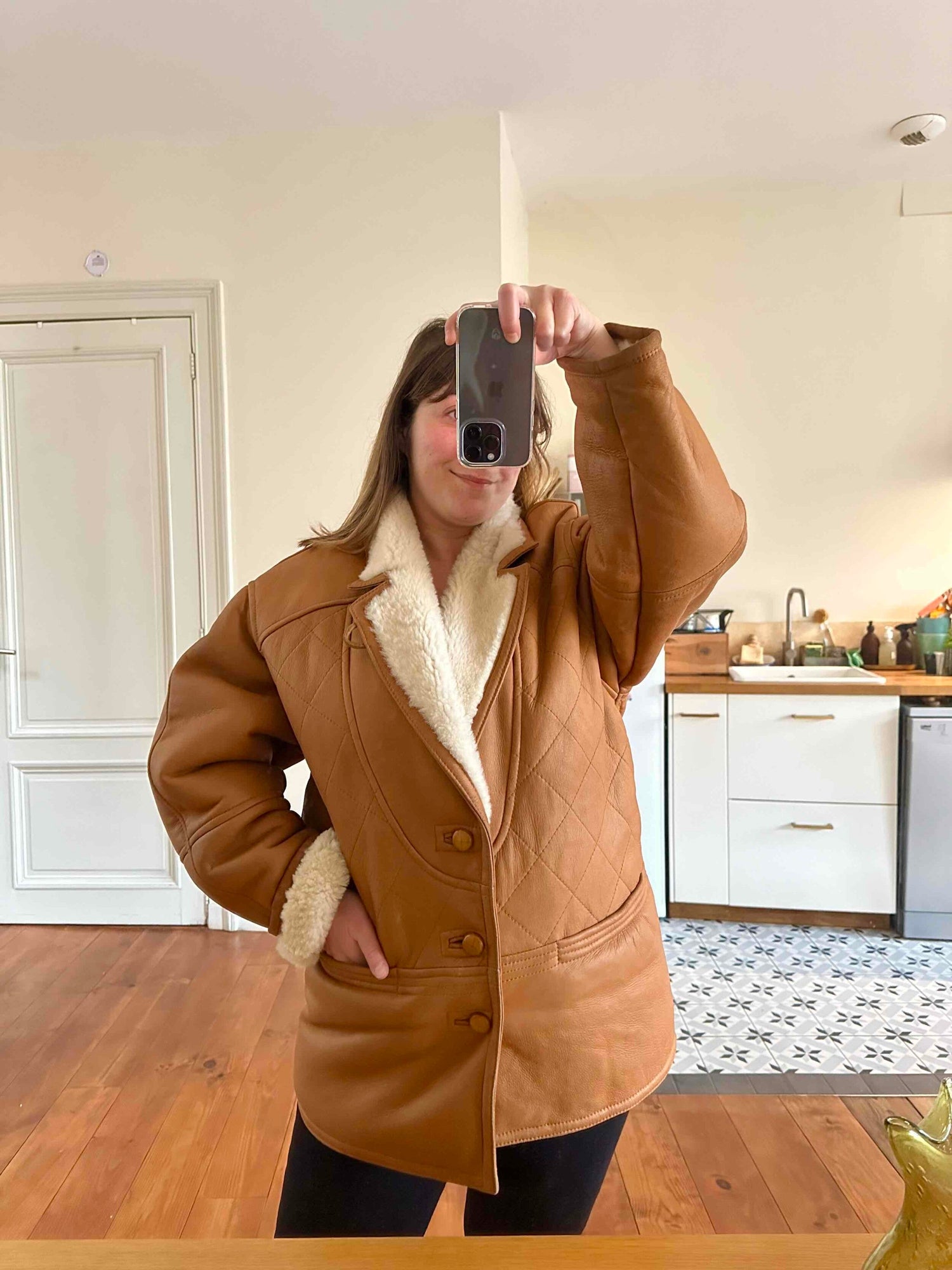 Manteau en peau lainée