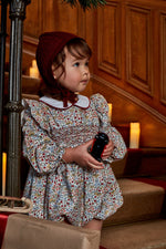 Julyne, barboteuse smockée, imprimé hiver multicolore