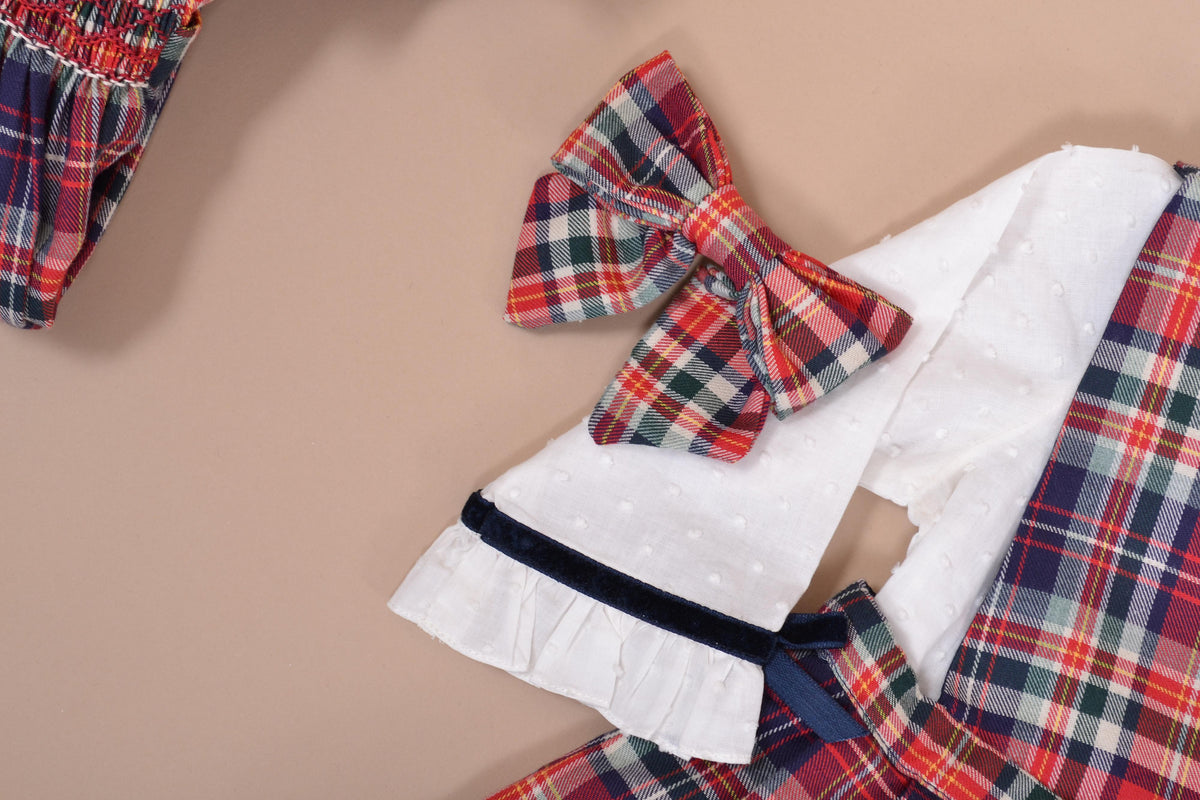 Mayeule, Jupe plissée réversible à bretelles, encolure cache-cœur ou ronde, en tartan rouge - Mayeule, Reversible pleated skirt with straps, wrap-around or round neckline, in Red tartan