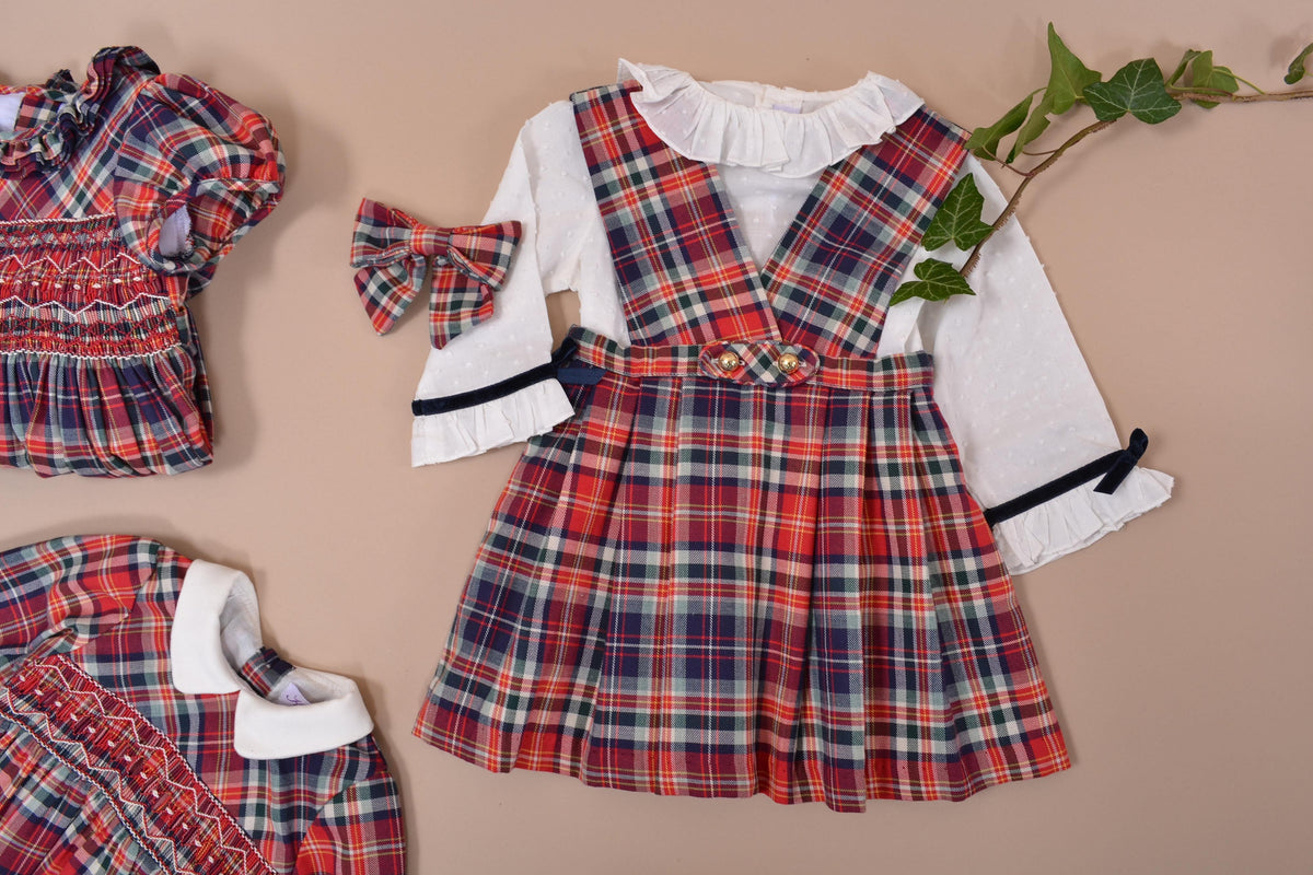 Mayeule, Jupe plissée réversible à bretelles, encolure cache-cœur ou ronde, en tartan rouge - Mayeule, Reversible pleated skirt with straps, wrap-around or round neckline, in Red tartan