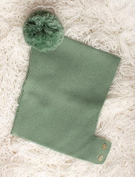 Pio, bonnet pour bébé avec pompon 100% laine vert