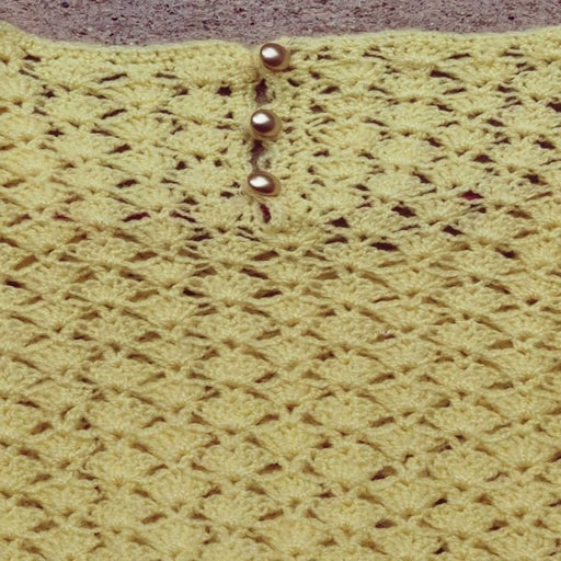 Pull en crochet jaune