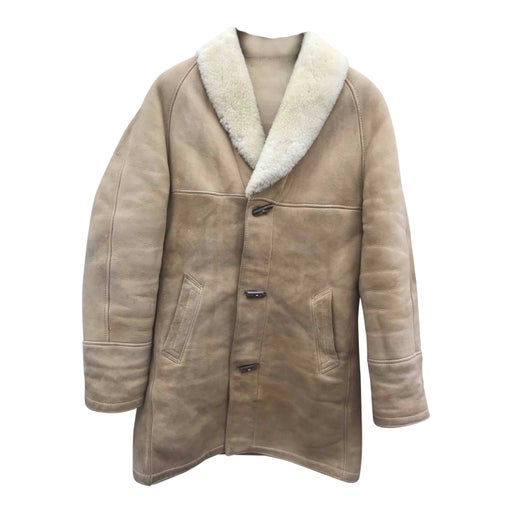 Manteau en peau lainée