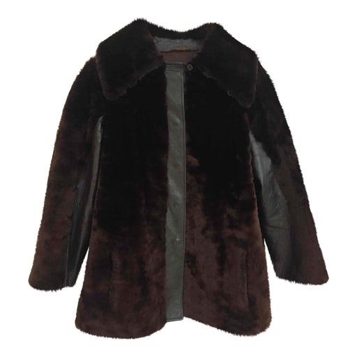 Manteau en fourrure et cuir
