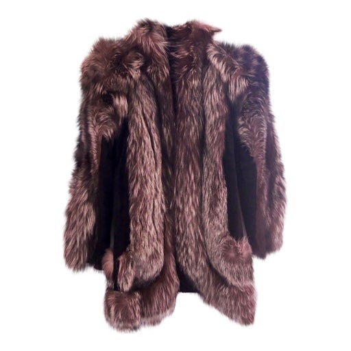 Manteau en cuir et fourrure