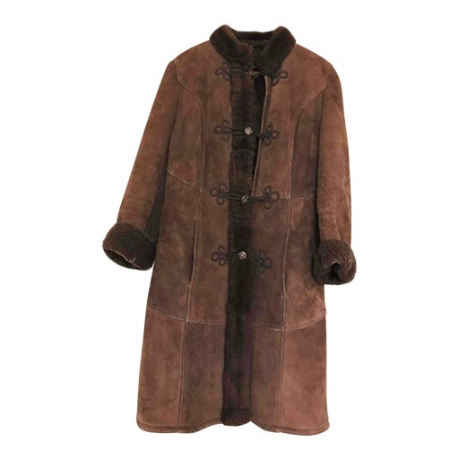 Manteau en peau lainée