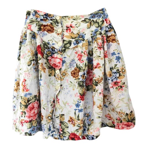 Mini jupe boutonnée à fleurs