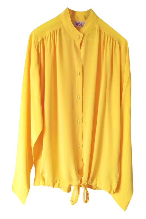 Bright yellow blouse in a very beautiful fabric