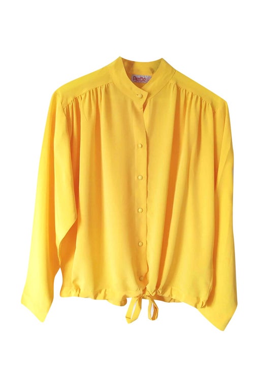 Bright yellow blouse in a very beautiful fabric