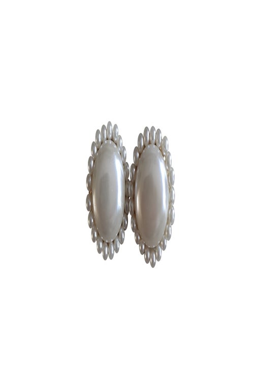 Pair of large clip earrings,