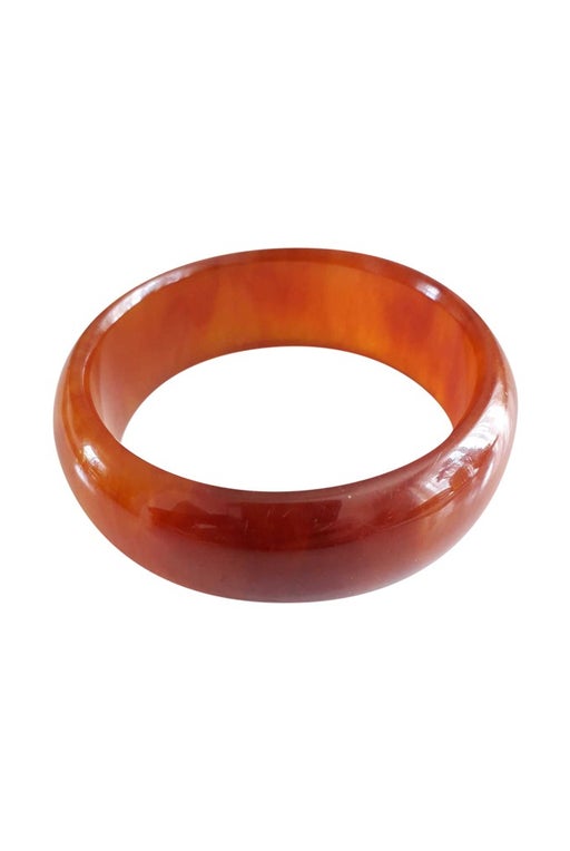 amber colored Bakelite bracelet,